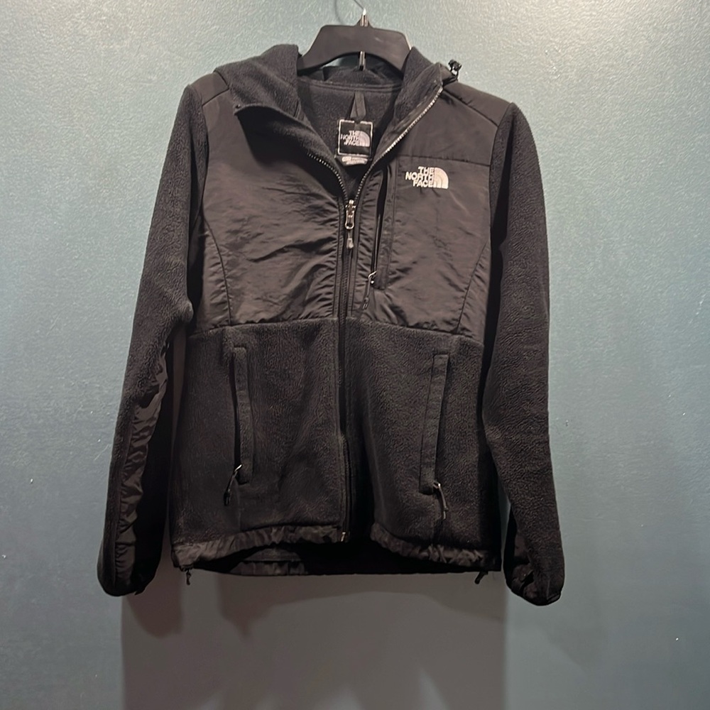 North face fleece jacket size xs black zippers work excellent.